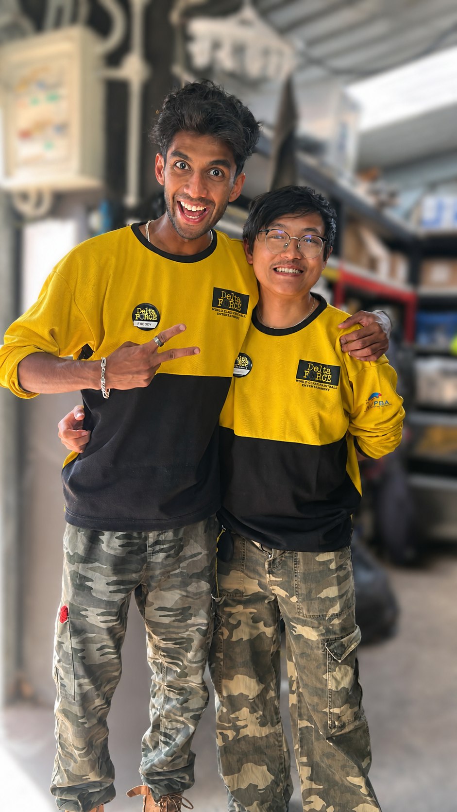 Two smiling Delta Force marshals ready to welcome arriving groups